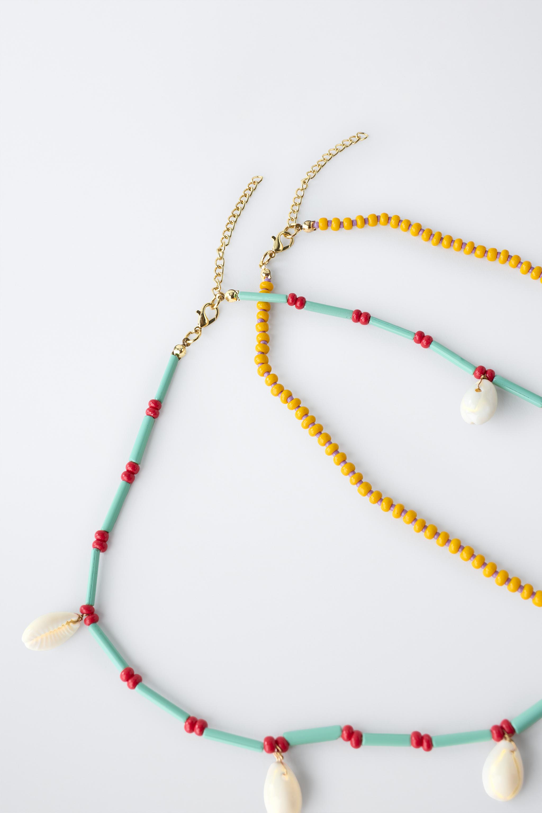 PACK OF TWO BEADED SHELL NECKLACES